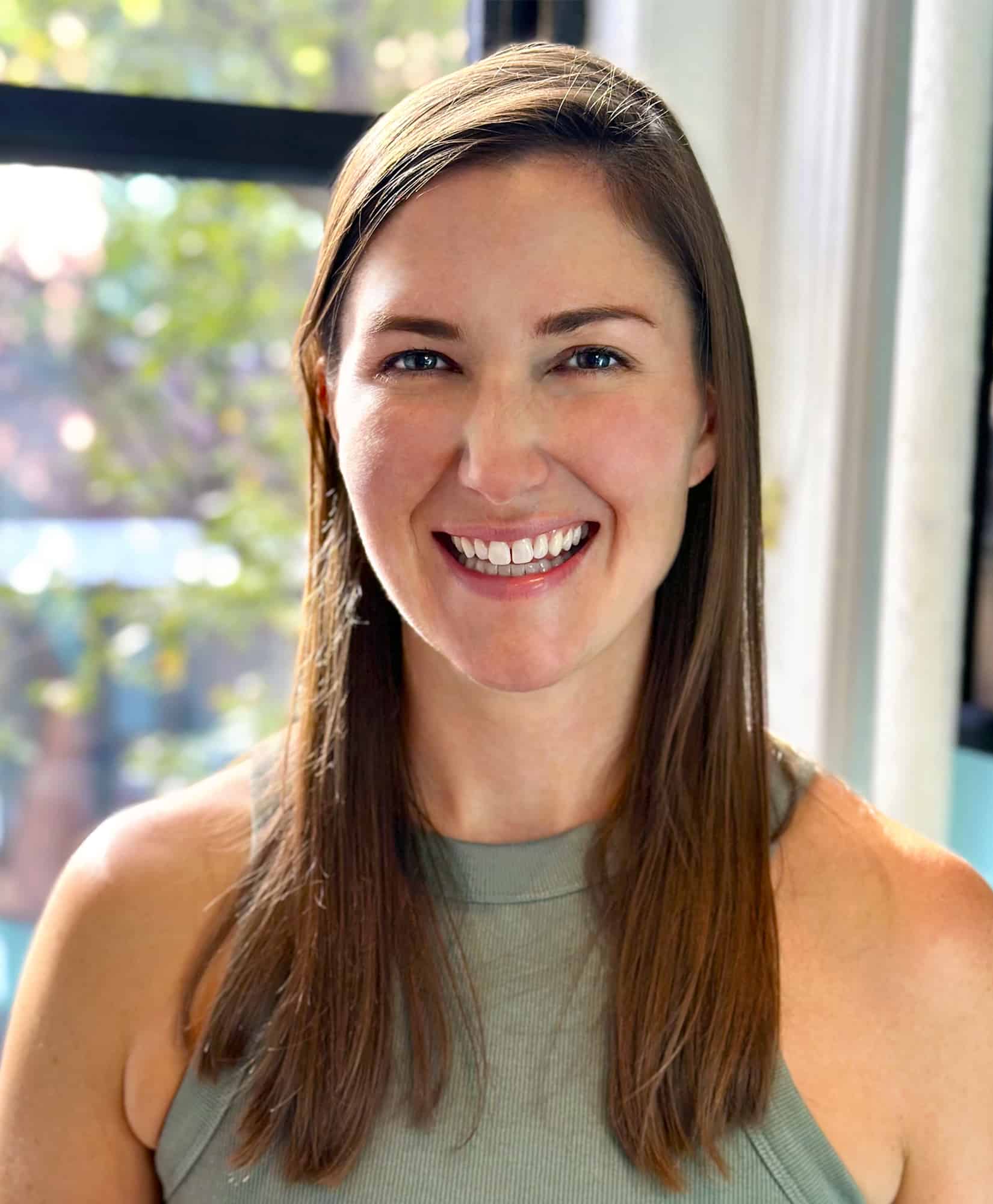 Headshot of Pilates instructor, Catherine Danaher.